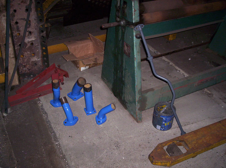 Some of the smaller water cooling pipes after being painted french blue, Photo by Andre Kent