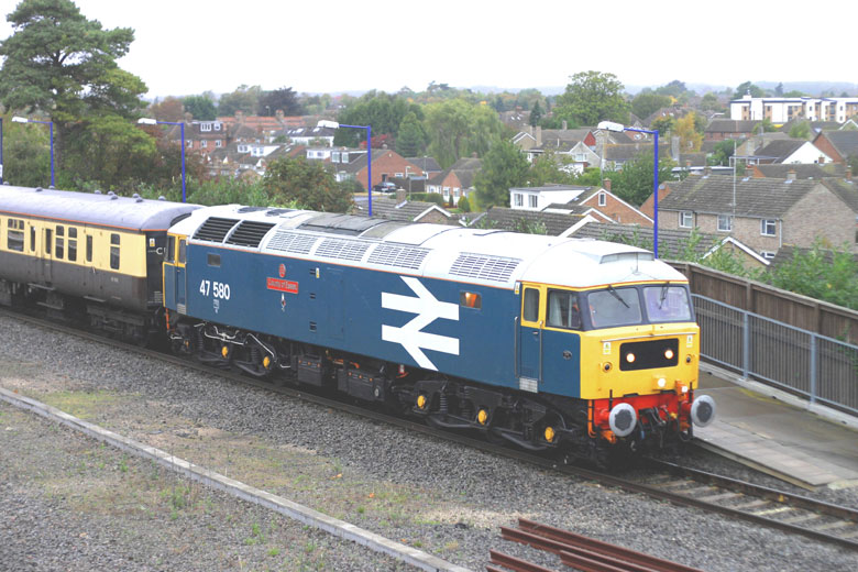 47580 passes through Bicester North with 1Z80 06:59 Birmingham Snow Hill - Southend Victoria on 03/10/09, Photo by Mark Beal