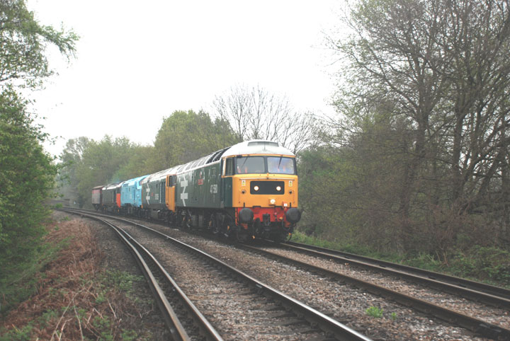 47580 aproches Byfleet with 6O88 Old Oak Common - Eastleigh on 17/04/09, Photo by James Stearn