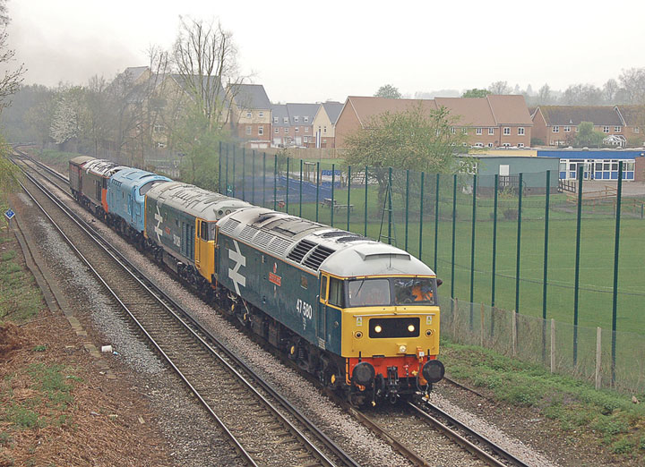 47580 accelerates away from Virginia Water with 6O88 Old Oak Common - Eastleigh on 17/04/09, Photo by Ian Parish