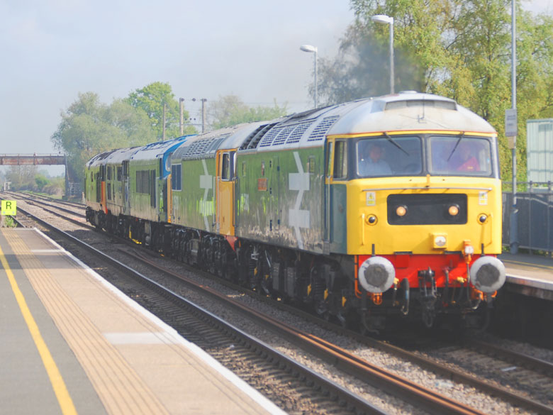 47580 approaches Ashchurch station with 56101, 45133, 31271, & 50135 with 0Z56 08:30 Kidderminster-Swanage on 05/05/10, Photo by Gary Lane
