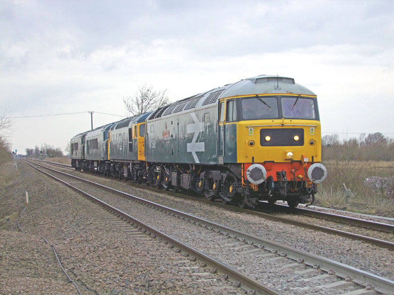 47580 heads across the fens at Black Bank with 0Z47 09:06 Tyesely-Dereham on 17/03/10, Photo by Geoff Tibble