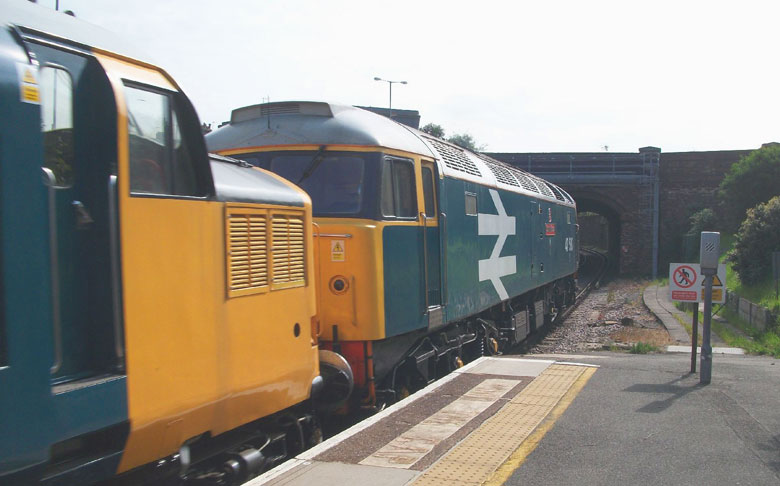 47580 passes through Bournemouth Station with 0Z97 08:15 Swanage - Kidderminster with 37254, 45133, 31271 and 50135 on 18/05/10, Photo by Steve Anstey