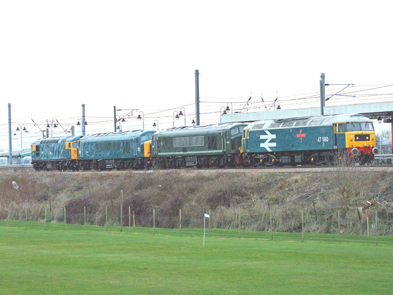 47580 at Ely with 0Z47 09:06 Tyesely-Dereham with D182, 45133 & 26007 on 17/03/10, Photo by Geoff Tibble