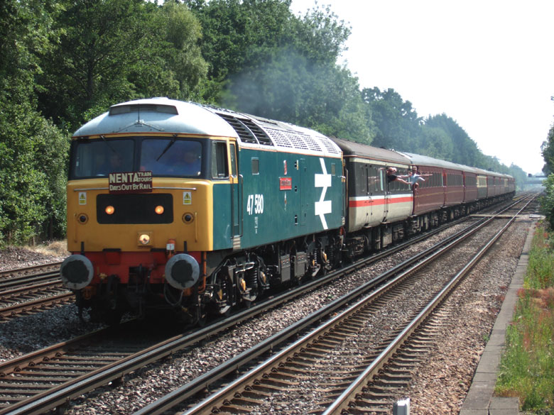 47580 storms through Fleet with 1Z74 05:18 North Walsham-Swanage on 26/06/10, Photo by Philip Marsland