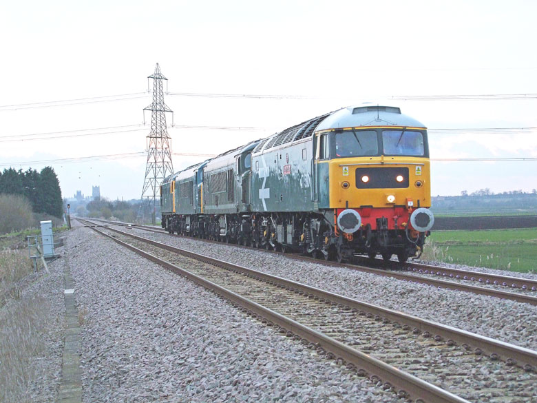 47580 at Prickwillow 47580 at Prickwillow with 0Z47 09:06 Tyesely-Dereham with D182, 45133 & 26007 on 17/03/10, Photo by Geoff Tibble