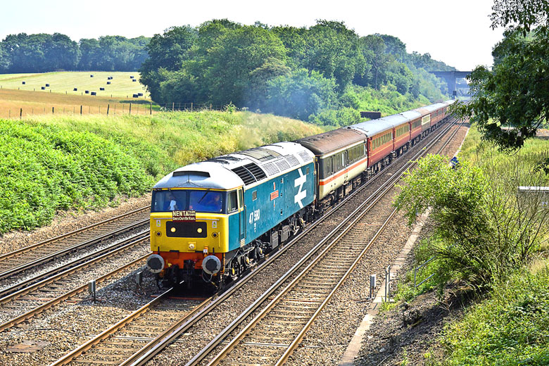 47580 stormes along the SWML at Totters Lane west of Winchfield with 1Z74 on 26/06/10, Photo by Tony Callaghan