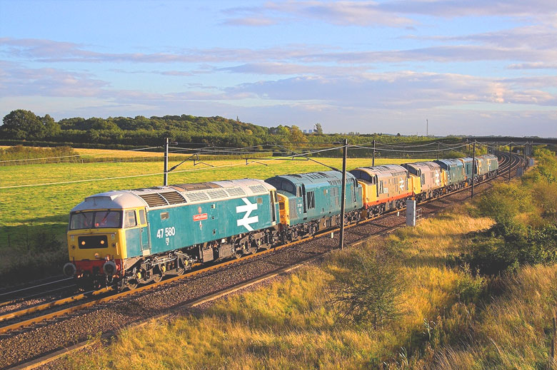 47580 departs Wymondham with 0Z41 10:36 Wymondham-Fletton Jn 37518 and 37109 in tow on 06/10/10, Photo by Marvin