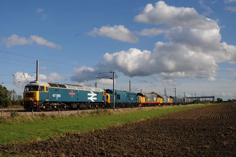 47580 departs Wymondham with 0Z41 10:36 Wymondham-Fletton Jn 37518 and 37109 in tow on 06/10/10, Photo by John Rudd
