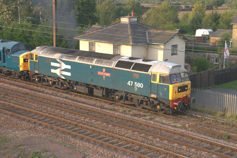 47580 passes through Bournemouth Station with 0Z97 08:15 Swanage-Kidderminster with 37254, 45133, 31271 and 50135 on 22/10/10, Photo by Geoff Tibble