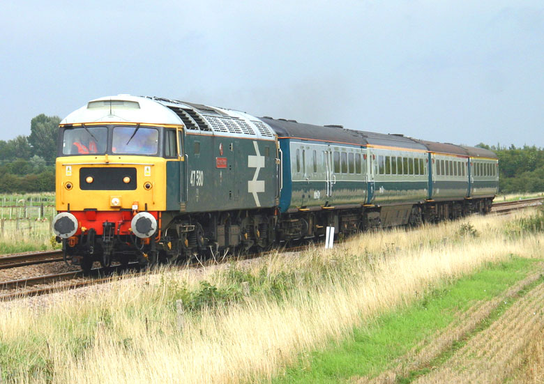 47580 approches Kelby Lane LC at Wilsford Warren with 1Z09 12:15 Derby-Sleaford on 10/09/10, Photo by Geoff Tibble