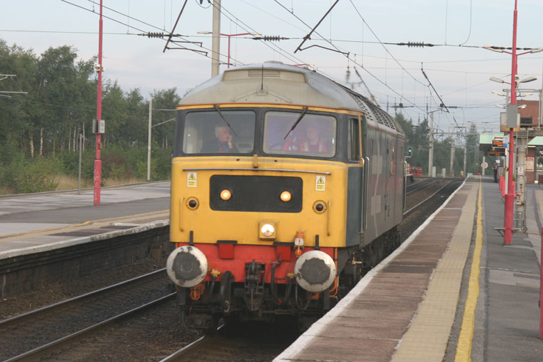 47580 passes through Wigan on route to East Lancashire Railway with 0Z37 07:00 Carnforth - Castleton on 22/09/10, Photo by Mike Williams