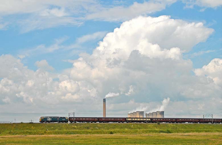 47580 head south in the ECML passed Eggborough Power Station with 1Z73 16:30 Scarborough - Holt on 09/07/11, Photo by Alan Padley
