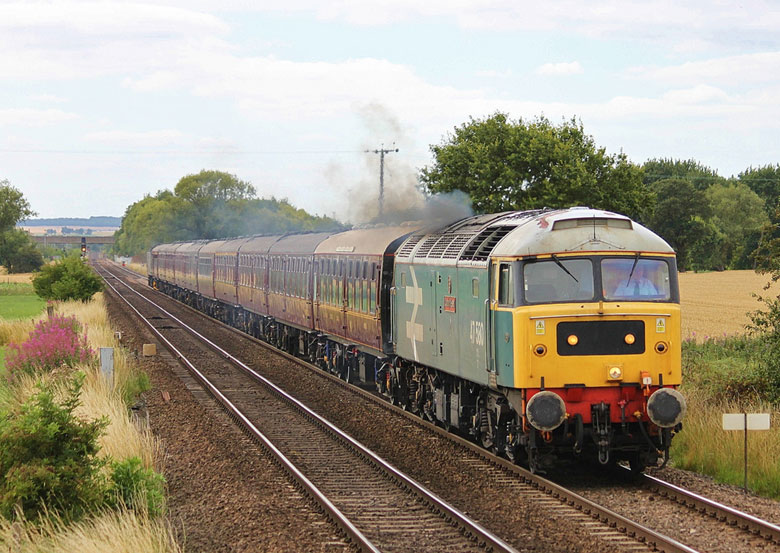 47580 approches Ruddings Farm LC, Hambleton with 5Z21 10:52 Carnforth - Licoln ECS on 29/07/11, Photo by Jonathan Dye