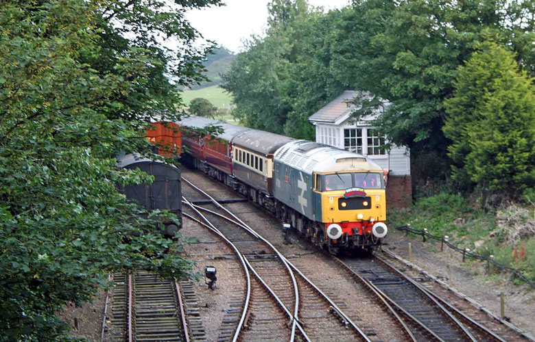 47580 passes Sheringham West signal box with 1Z72 06:05 Holt - Scarborough on 09/07/11, Photo by Geoff Tibble