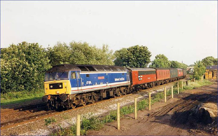 47596 passes Duffield with 1E46 15:05 Northampton - Leeds Mail on 12/06/92, Photo by Phil Chilton