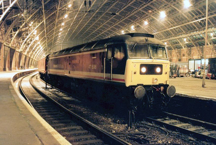 47596 heads a North bound parcels service at London St. Pancras, Photo by Noel Creswell