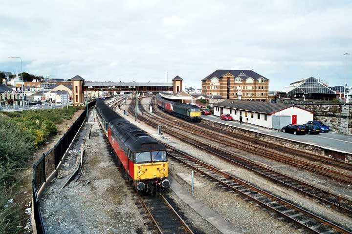 47732 in Holyhead carriage sidings and 47830 with 1A62 13:35 to Euston 16/08/03, Photo by Richard Boyd