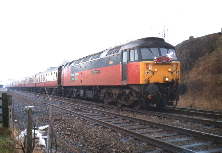 47732 stands at Appleby with Kings Cross - Carlisle Charter on 20/12/97, Photo by Alan Walker