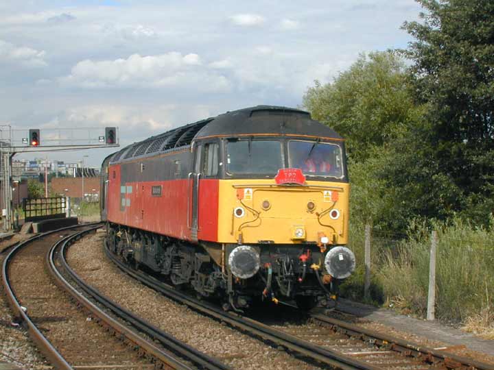 47732 at Clapham Jn. with 1O90 16:30 Willesden - Dover caring Dover TPO farewell headboard on 24/07/03, Photo by James Stearn