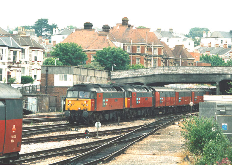 47732 arrives at Plymouth with 47721 and vans on 12/06/97, Photo by Neil Cannon