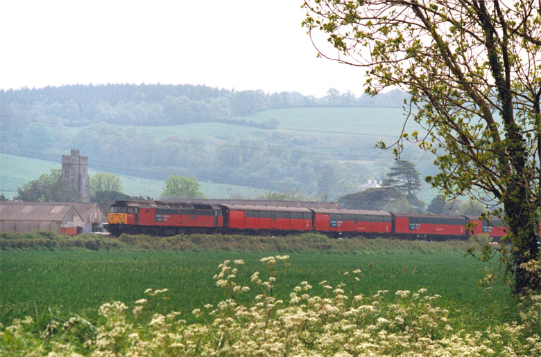 47732 with north bound vans at Stoke Cannon north of Exeter on 05/05/99, Photo by Neil Cannon