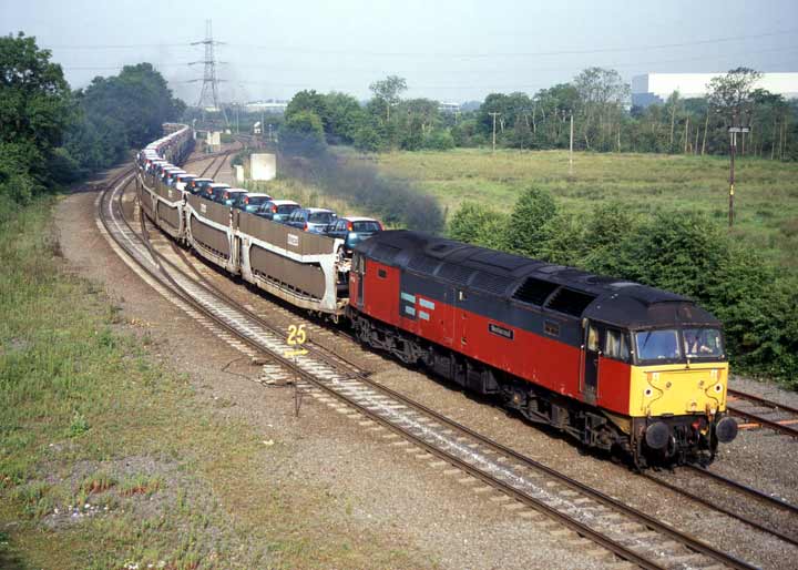 47732 passes Whitacre Jn. with 6F45 Washwood Heath - Corby car train, Date 25/06/01, Photo by Phil Grain